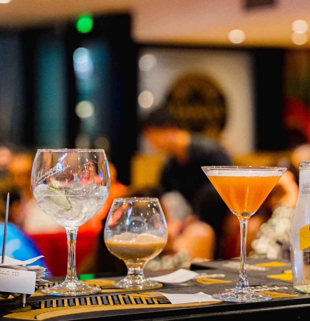 Gin, brandy and a cocktail at the bar at Dawat Bar and Kitchen