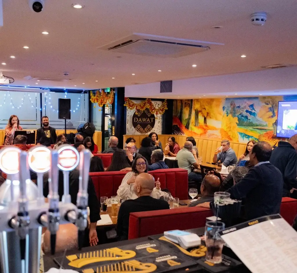A full dining room during a live set at Dawat Bar and Kitchen