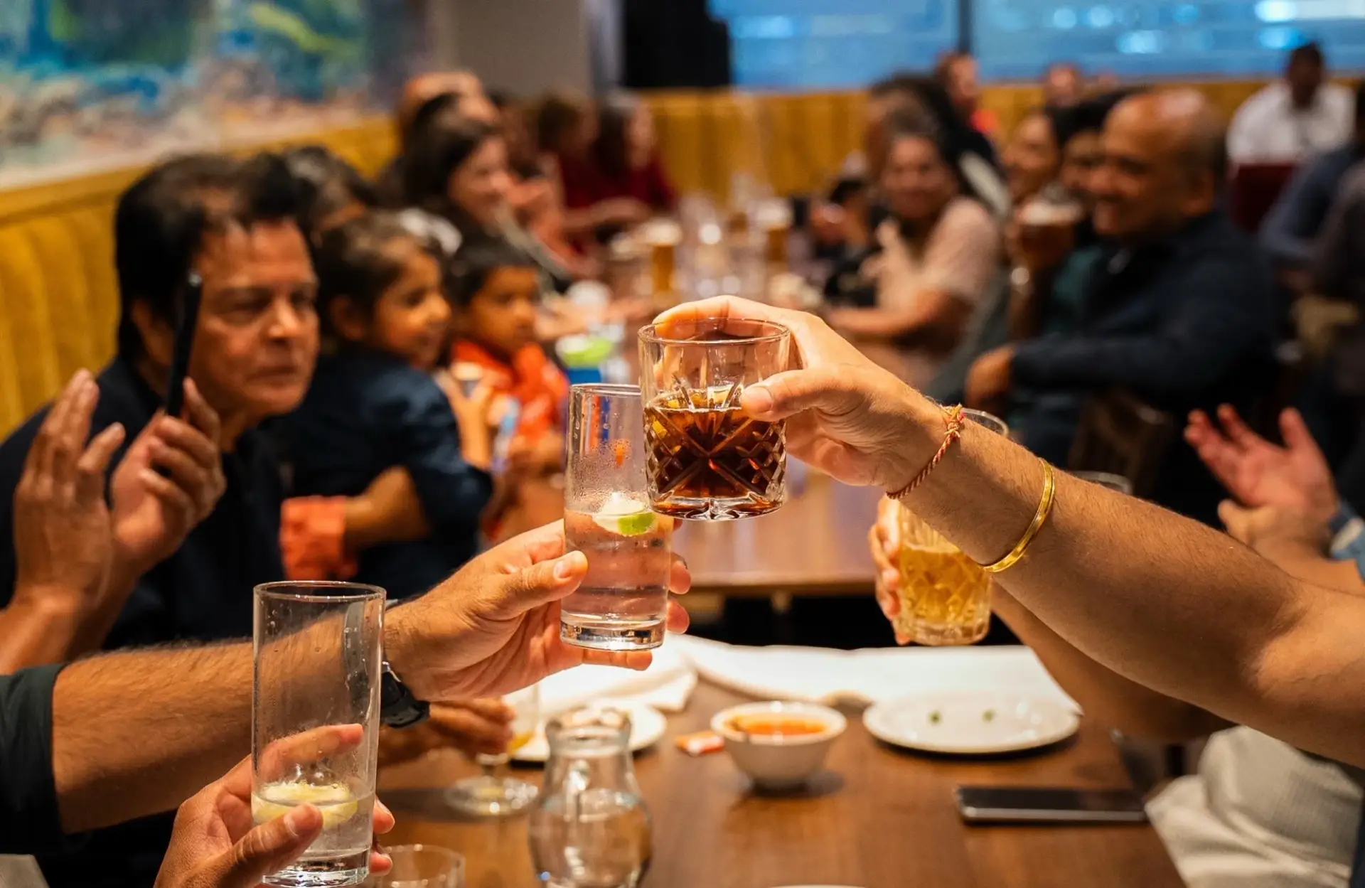 Guests raising a toast at Dawat Bar and Kitchen