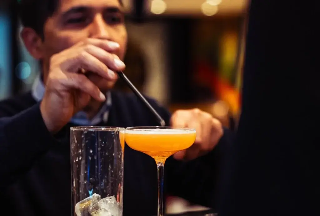 Bartender finishing a cocktail at Dawat Bar and Kitchen