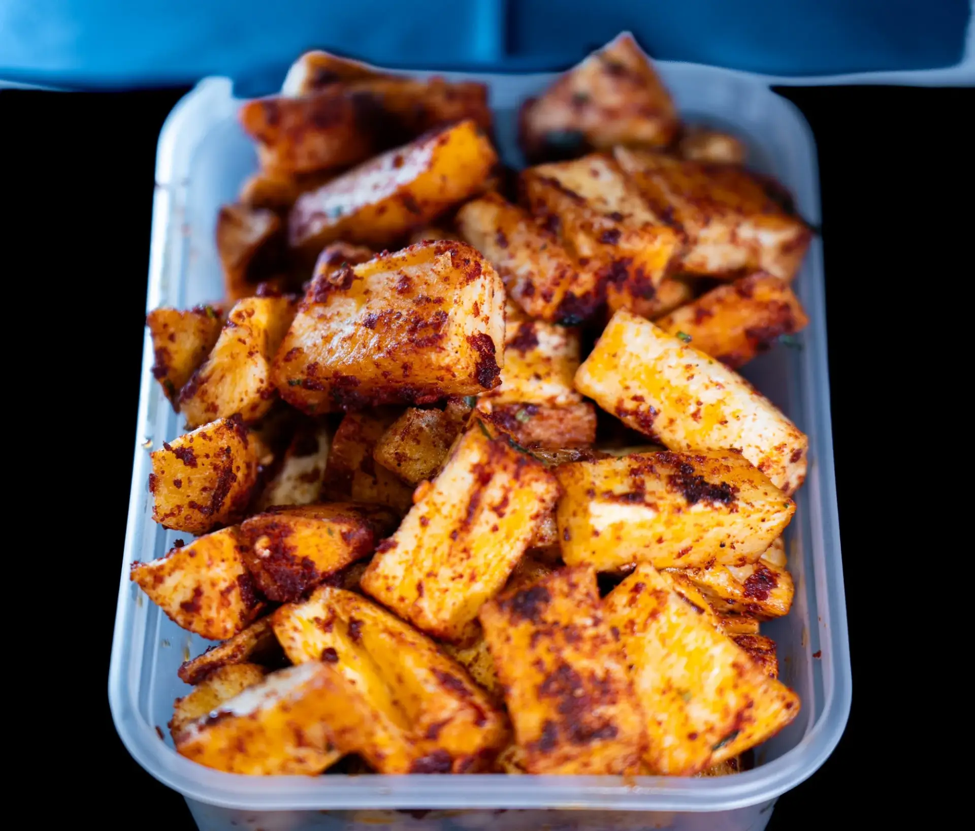 Paneer tikka in a takeaway box from Dawat Bar and Kitchen